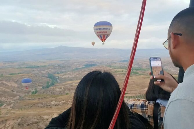 Cappadocia : Hot Air Balloon Flight Basket Size 15-18 Person |Çat - Stop 1: Cappadocia Pickup and Airport-Style Waiting Energy