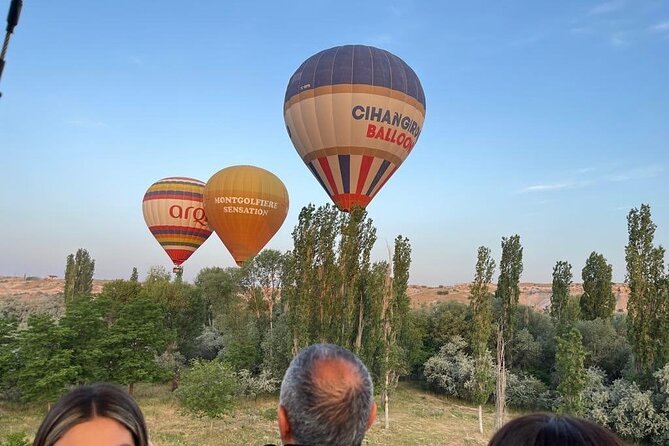 Cappadocia Hot Air Balloon Ride over Cat Valley with Transfers - Weather Cancellations and Route Changes: Why Photos Are Not Guarantees
