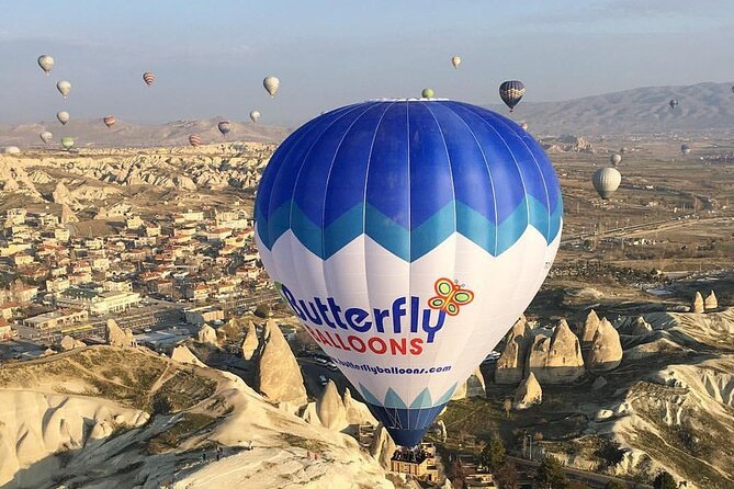 Cappadocia Hot Air Balloons or Kelebek Flight - Launch Site Magic: Balloons Inflating and Your First Look