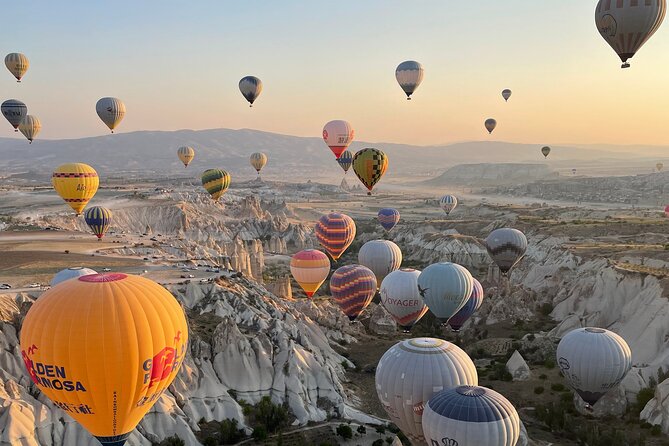 Cappadocia Sunrise Hot Air Balloon Flight / Discovery Balloons - Two view stops: Göreme town caves and the National Park bird’s-eye angle