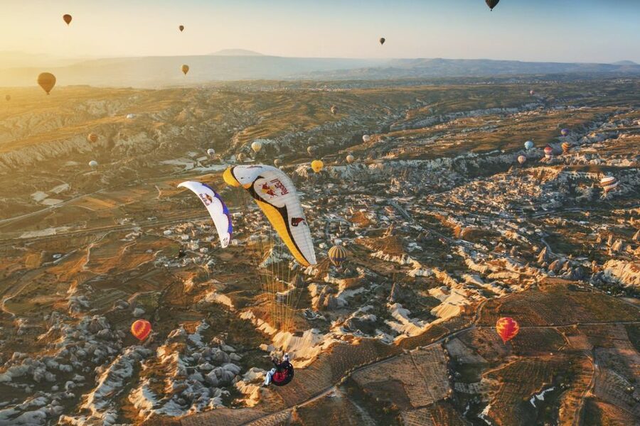 From Urgüp/Göreme: Cappadocia Tandem Paragliding & Transfer - Choosing sunrise, daytime, or sunset timing for the best ride