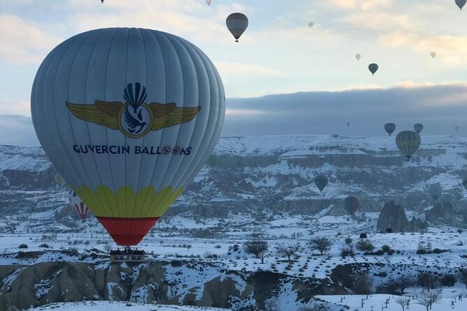 Goreme/Cappadocia Sunrise Hot Air Balloon Flight with Pickup - In the Sky: Fairy Chimneys Views, Balloon Convoys, and Pilot Maneuvers