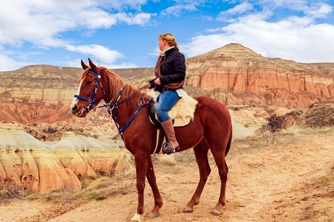 Horse Riding in Cappadocia in fairy chimeys - Red Valley Top Pauses and Cross Church Cafe for the Horse Break