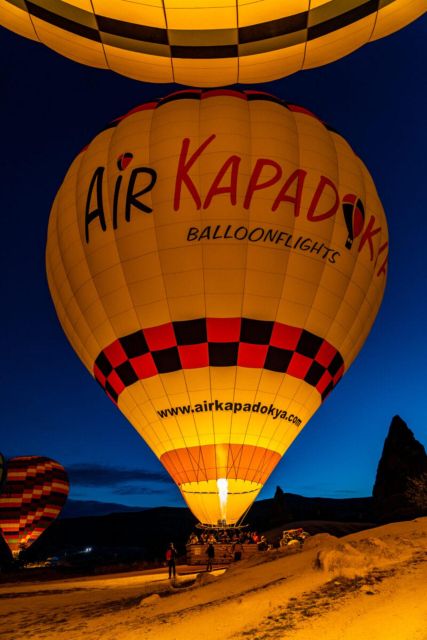 Hot air balloon tour at first light in Cappadocia - Hotel Pickup at 04:30-05:30, Breakfast Stop, and the Balloon-Inflation Show